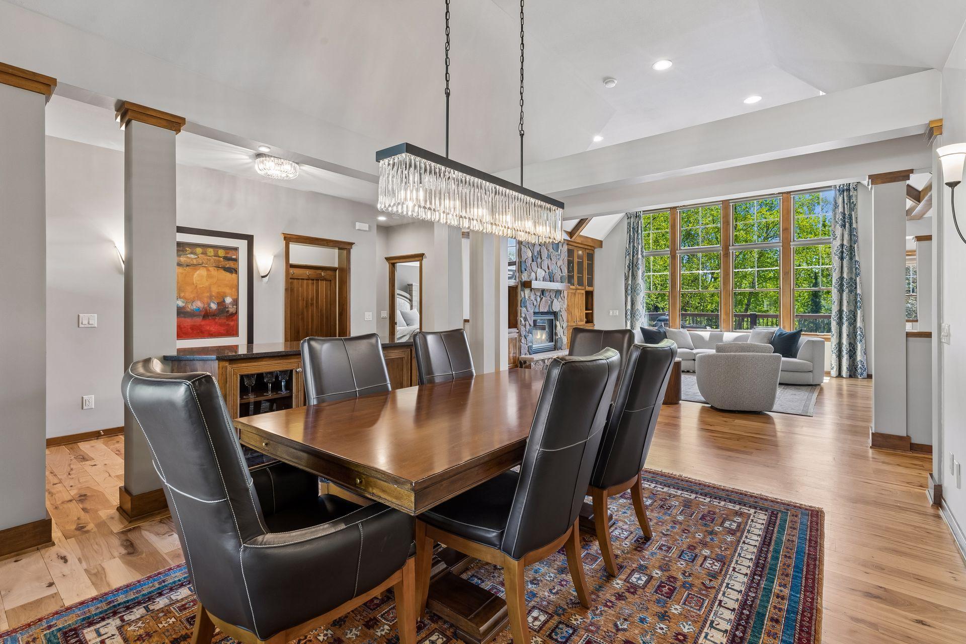 Another view of the main level's open layout. The home features knockdown ceilings throughout, recessed lighting, and is wired for surround sound.