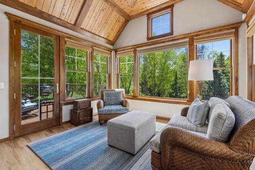 This view of the sunroom highlights the access to the backyard deck.