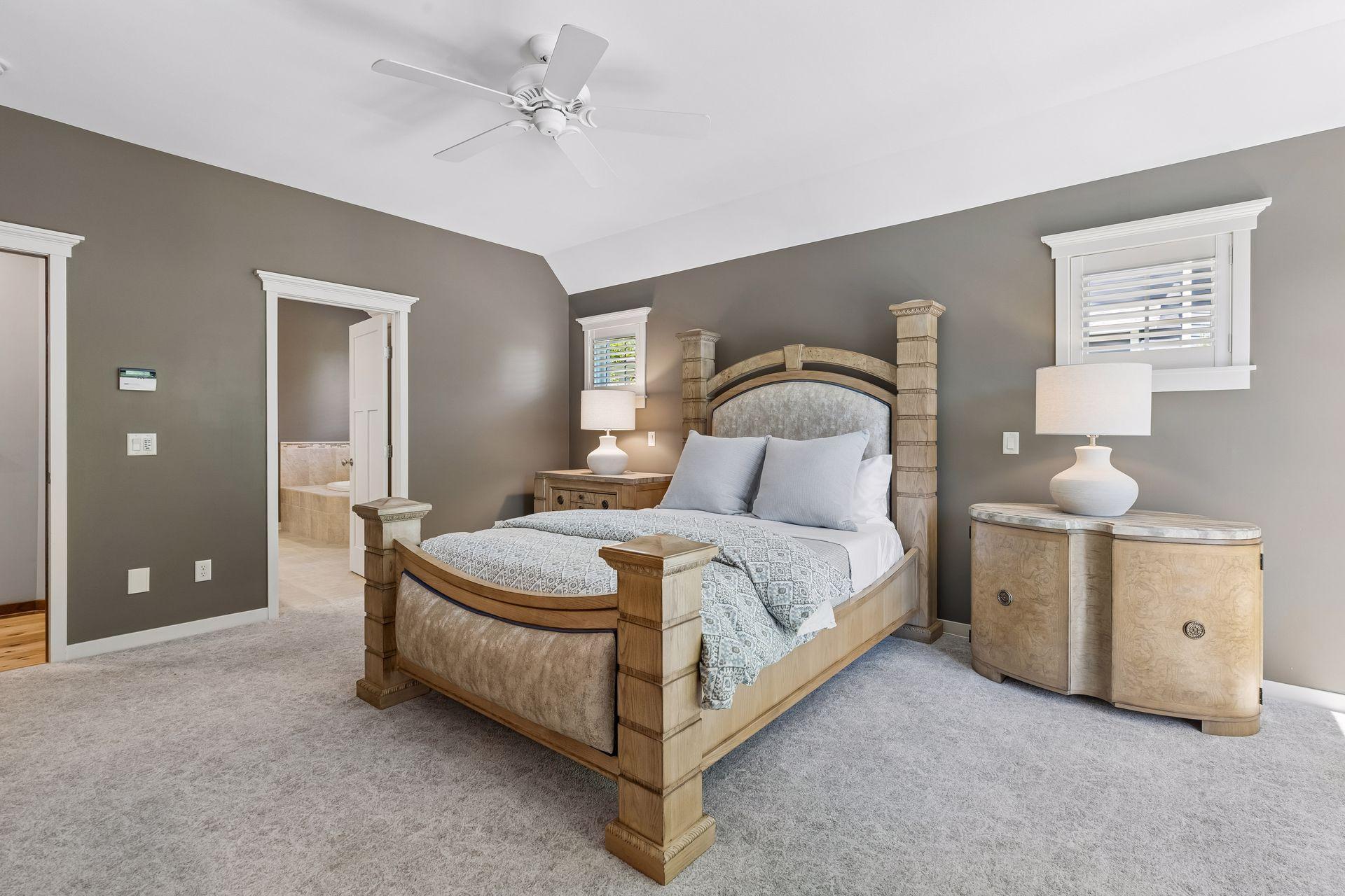 The primary bedroom suite features a private full bathroom and a large walk-in closet.