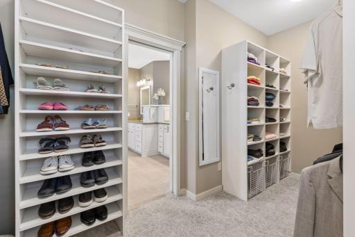 Another view of the walk-in closet and the organizational system.