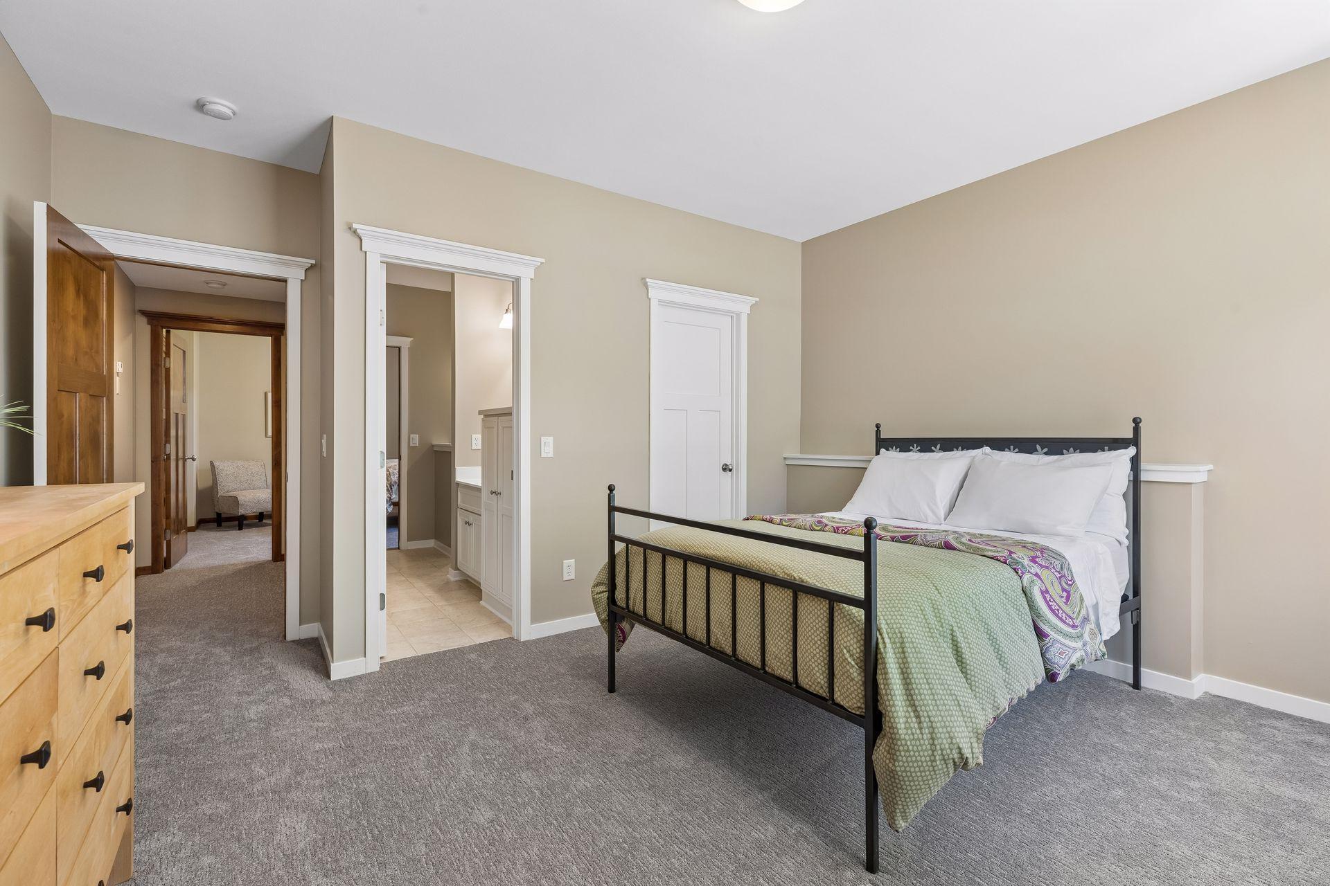 This view of the bedroom highlights the closet & access to the full Jack & Jill bathroom.