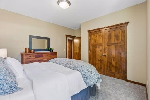 This view of the room highlights the large closet & how bright the room can be.
