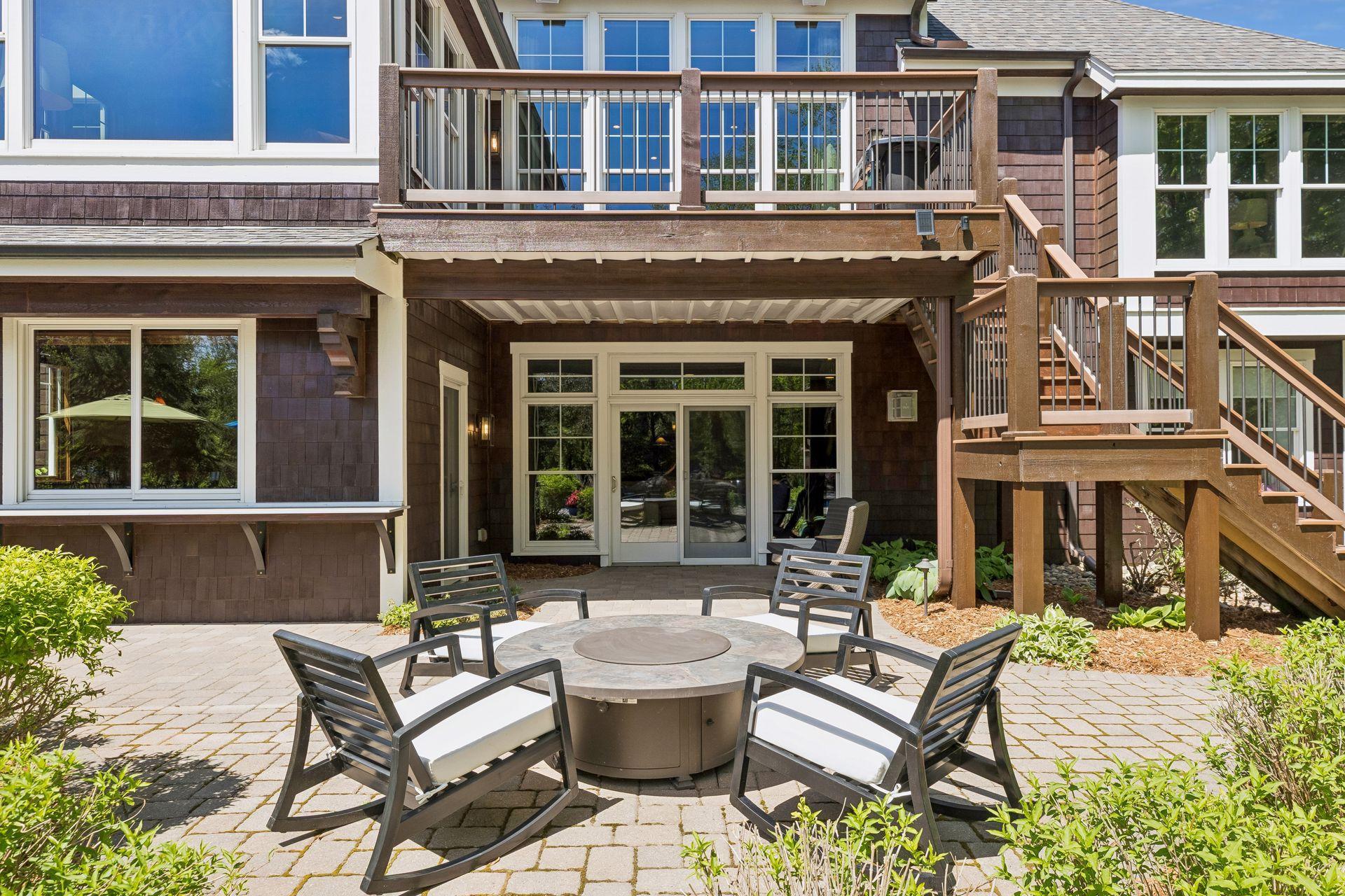 A great view of the deck & paver patio area. Belly up to the Dekton counter for a cool drink from the indoor wet bar.