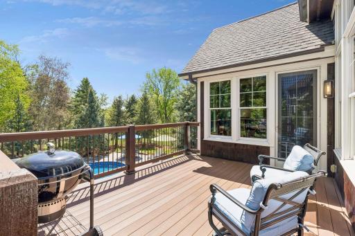 Just off the sunroom is a spacious new TimberTech (2025) maintenance-free deck (15' x 11'9") that overlooks the resort-like backyard. Its location near the kitchen is perfect for grilling.