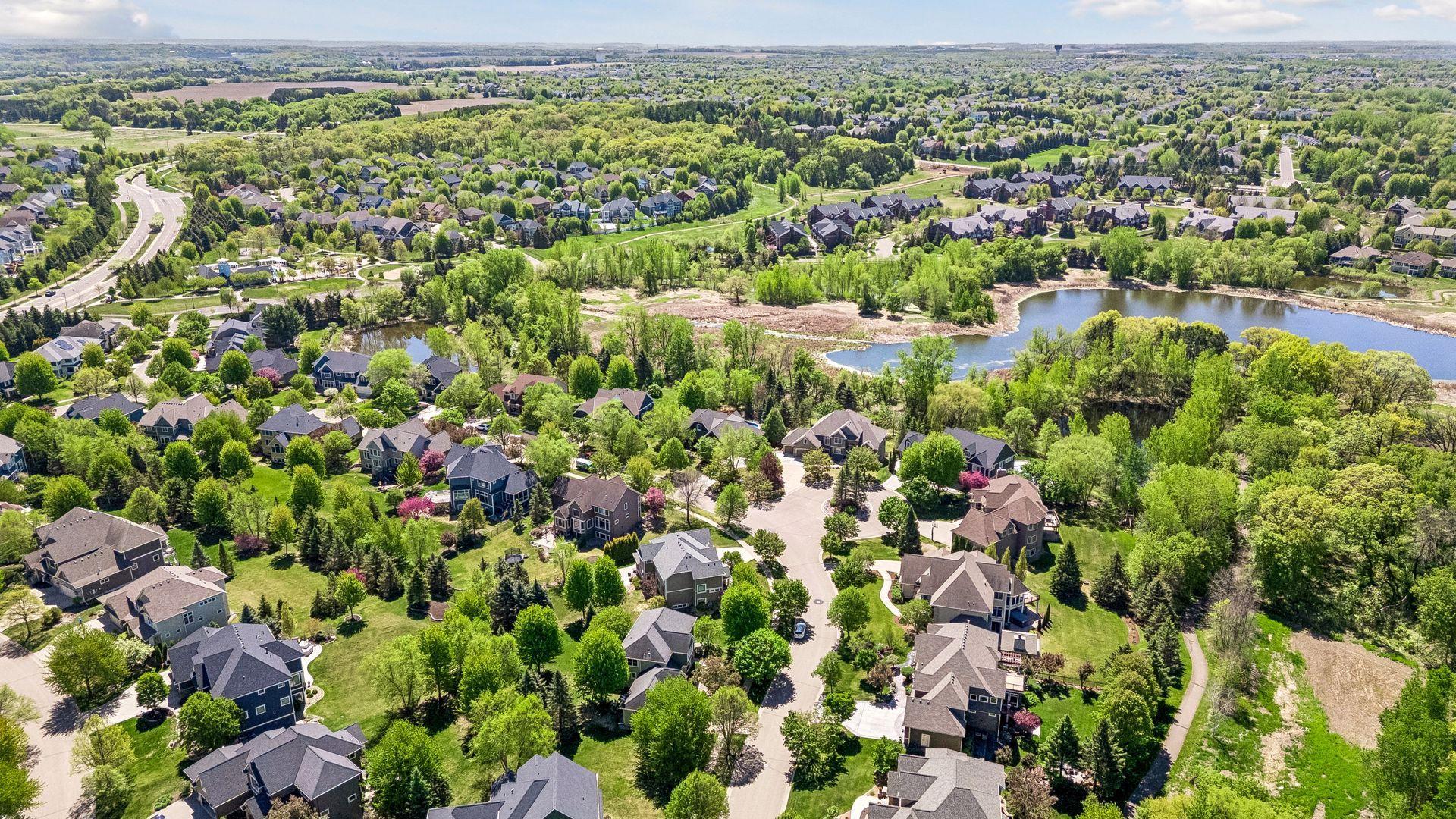 This 4-bedroom, 4-bathroom home is located in the desirable Dancing Waters community.