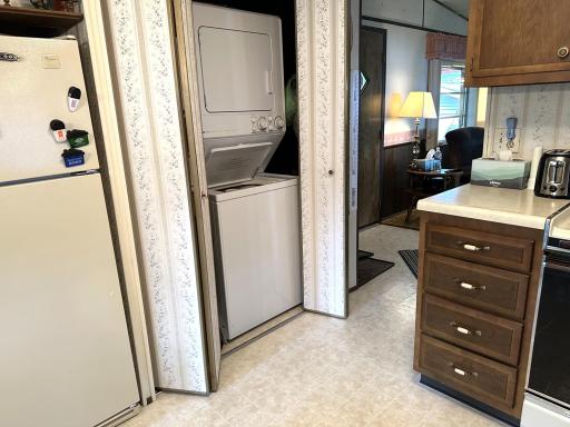 Stackable washer & dryer in kitchen closet