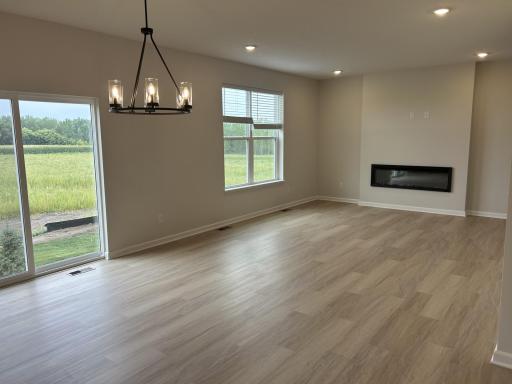 Dining area adjacent to family room with wonderful backyard views.