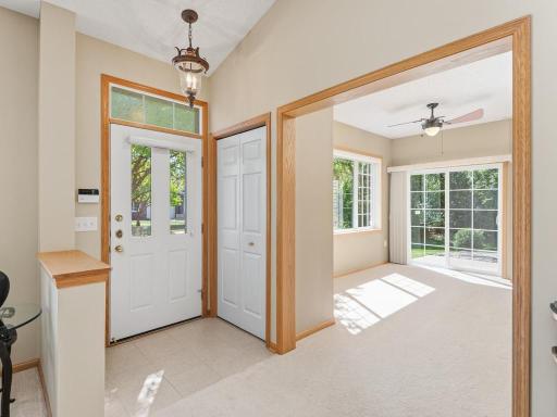 Entry has coat closet & opens to the light-filled Sunroom.