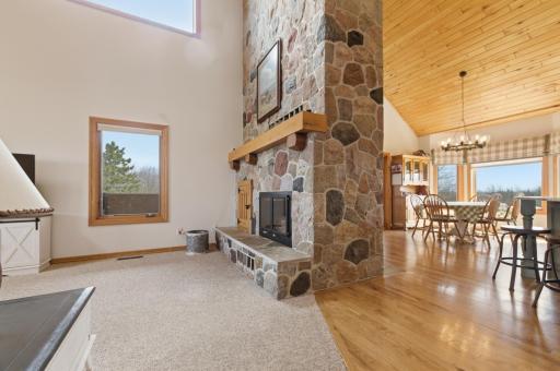 Two sided wood burning split rock fireplace