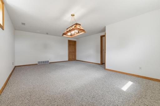 Lower level billiard room/or potential theater room