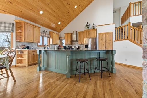 spacious kitchen boasts granite countertops