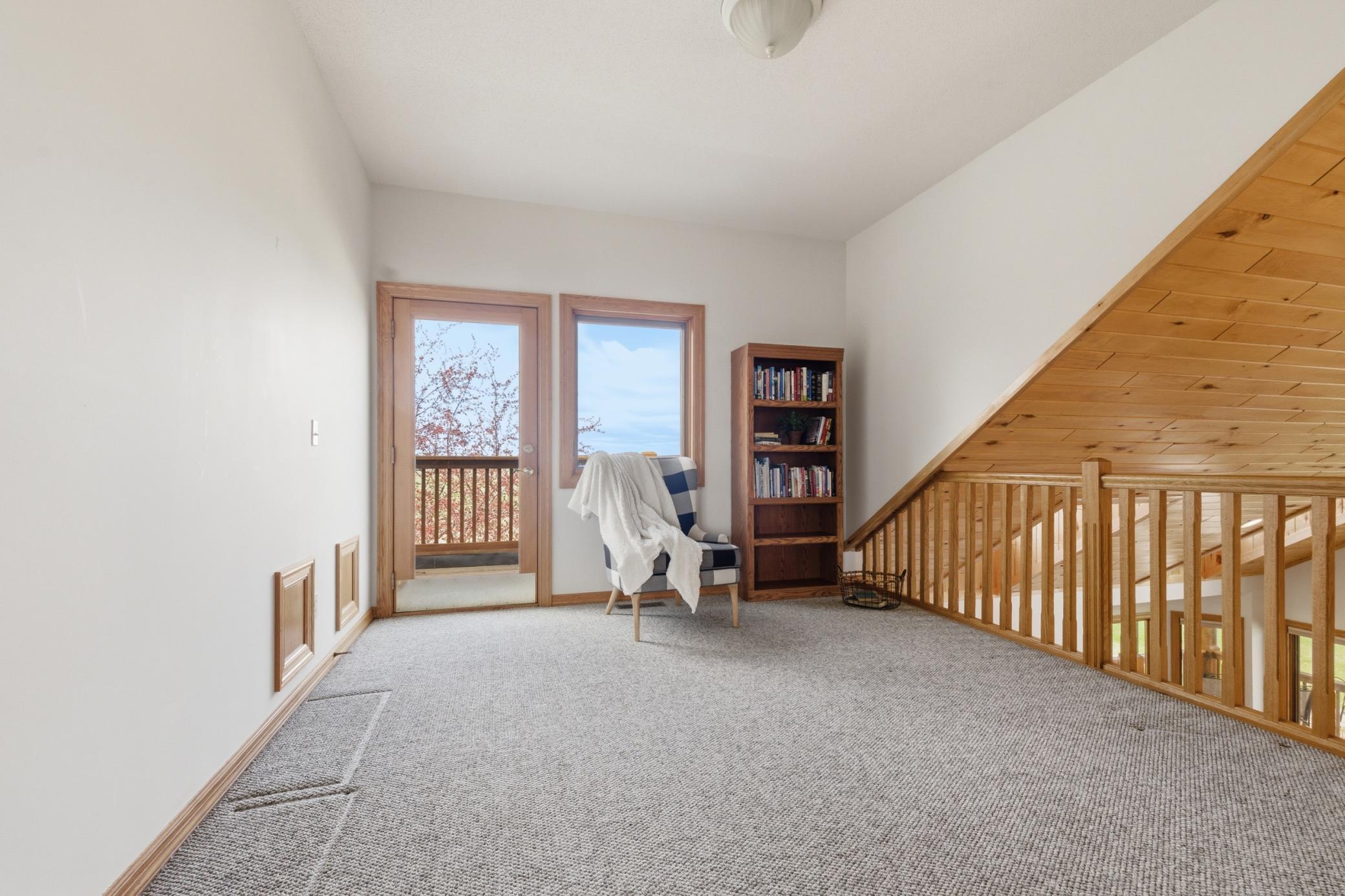 Upper lever balcony with private west facing deck