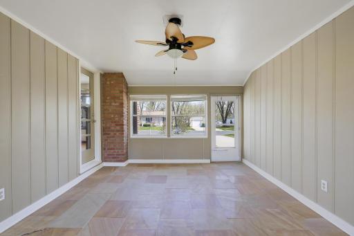 Brick detail, custom-painted panel walls and a fandelier!