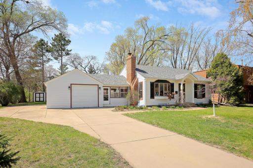 It is so sensible to have a cement driveway and side parking or bonus patio space.