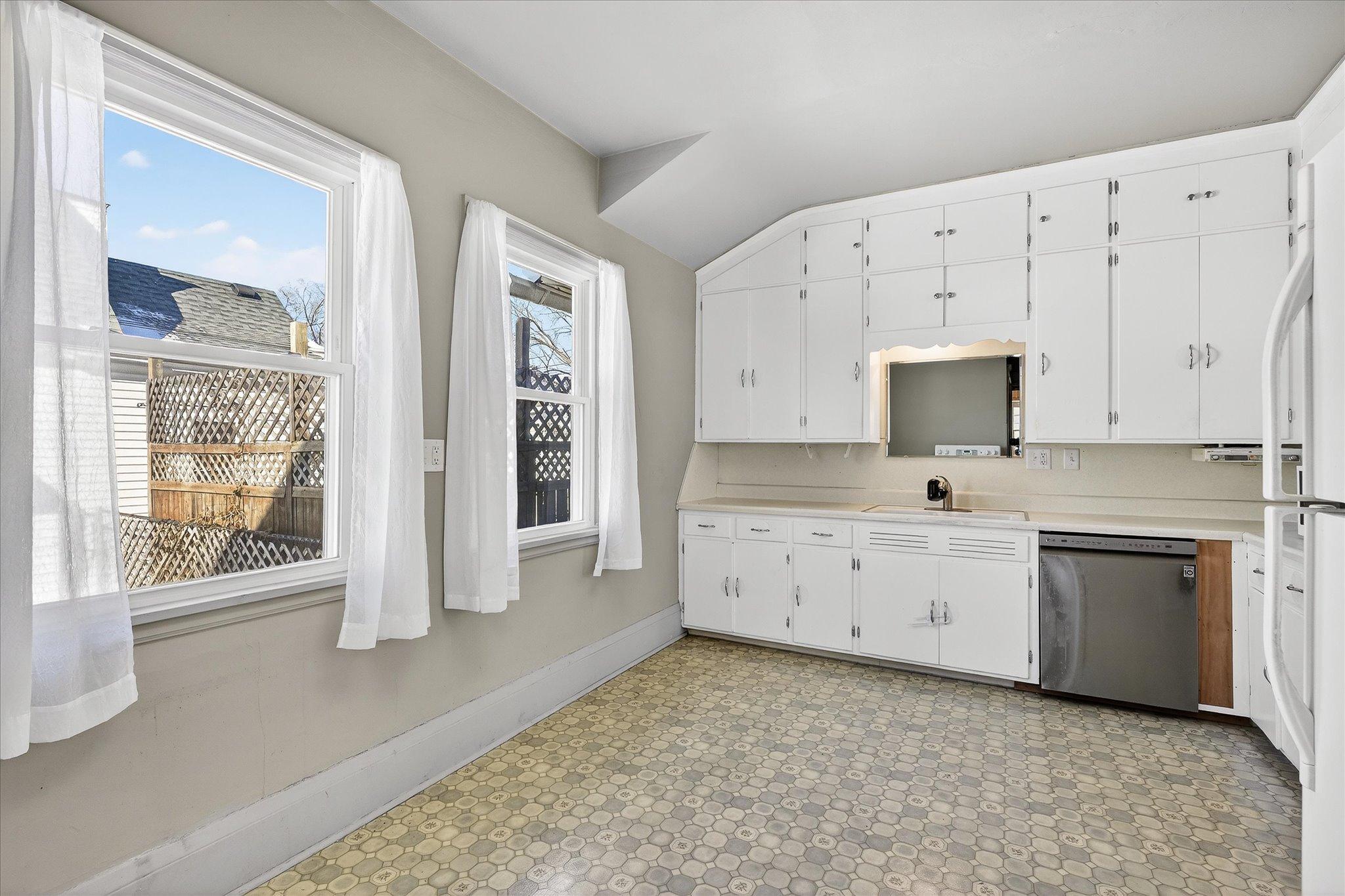 Room for a kitchen island or breakfast nook.