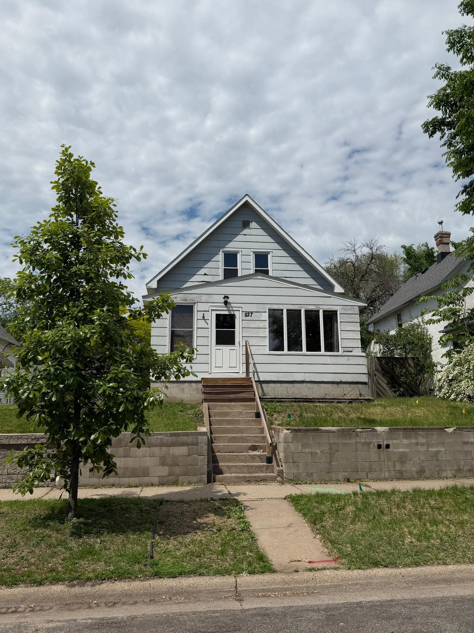 Perched above the sidewalk on a quiet block near Frogtown Farm.