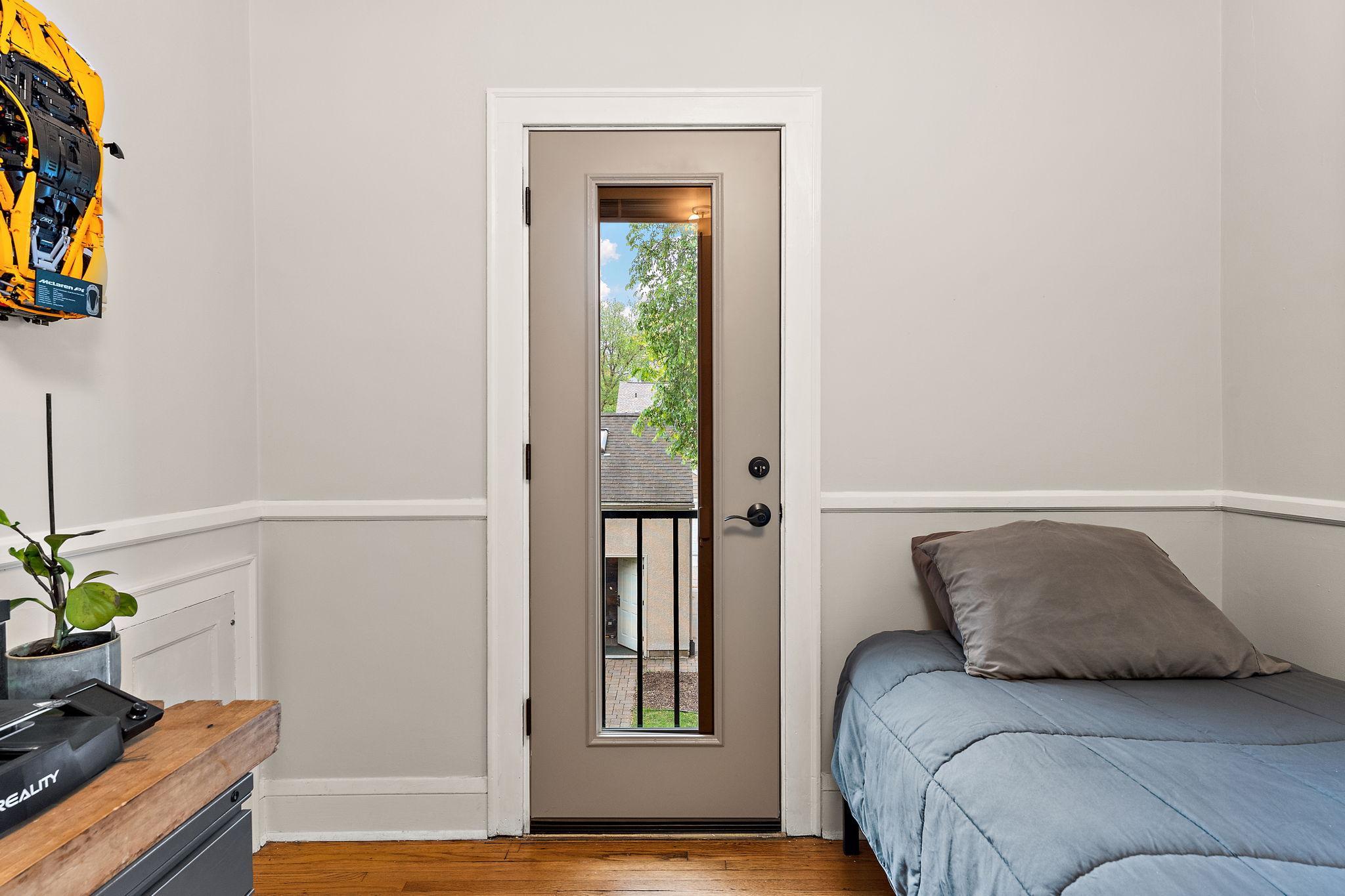 Door in main floor bedroom - could add a deck off this room