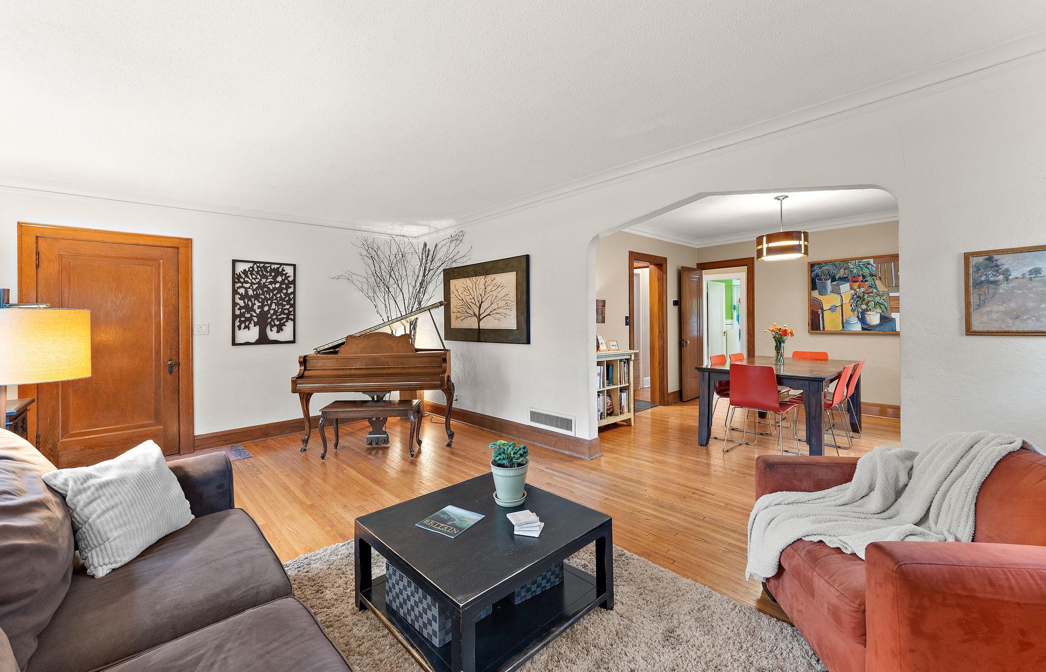Living room and dining flow seamlessly. Perfect for entertaining