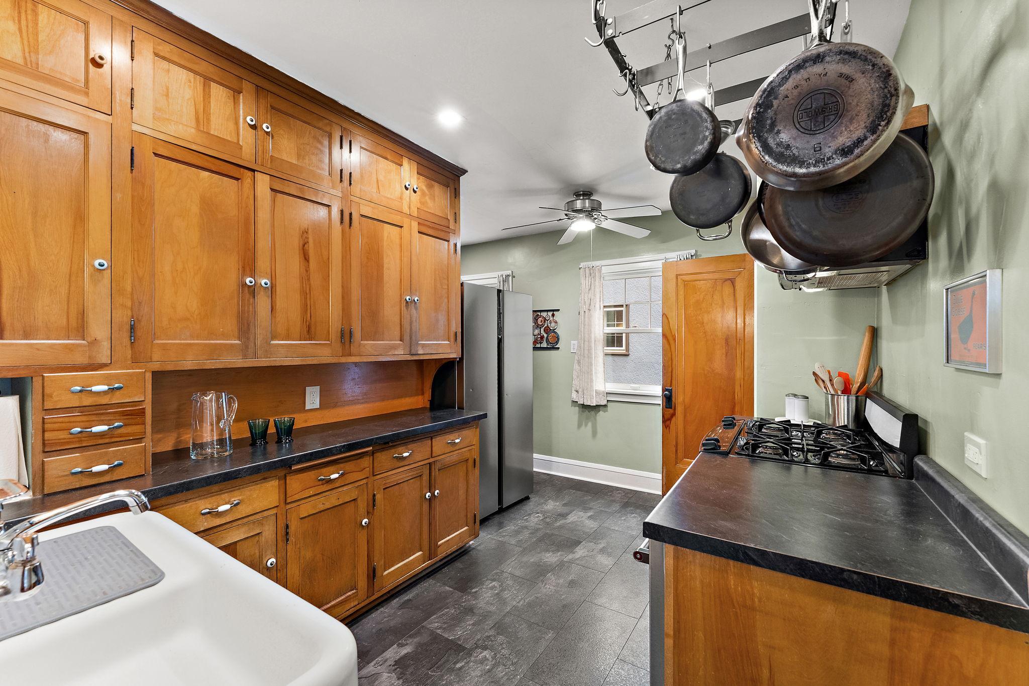 Original floor to ceiling cabinets. Gorgeous.