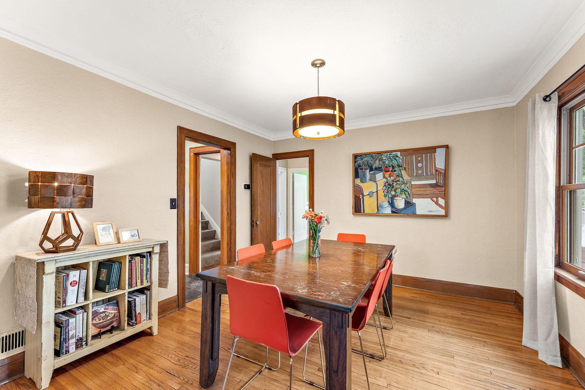 Dining Room situated between Kitchen and Living Room.