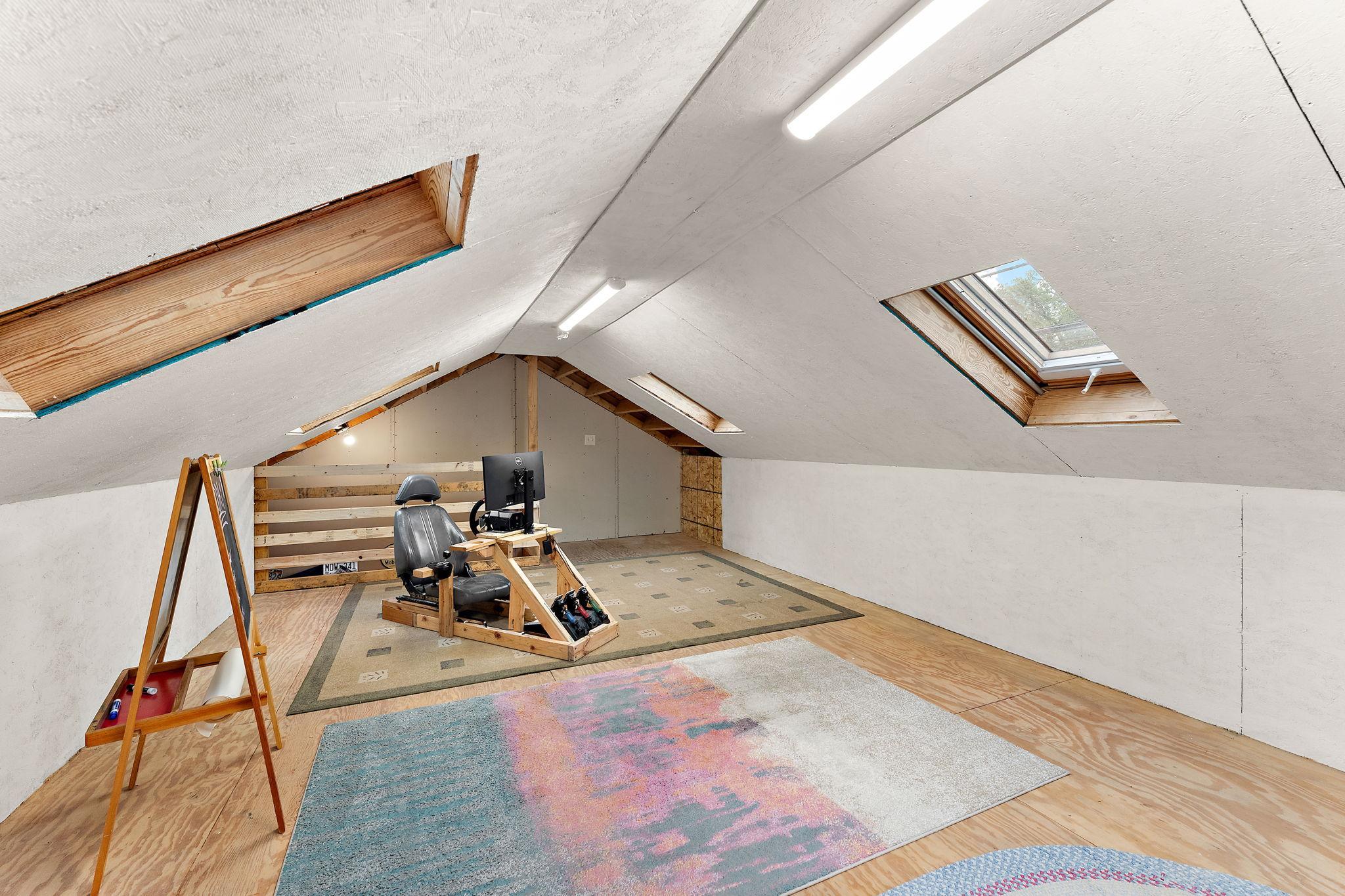 Light filled loft space above the new 2 car garage