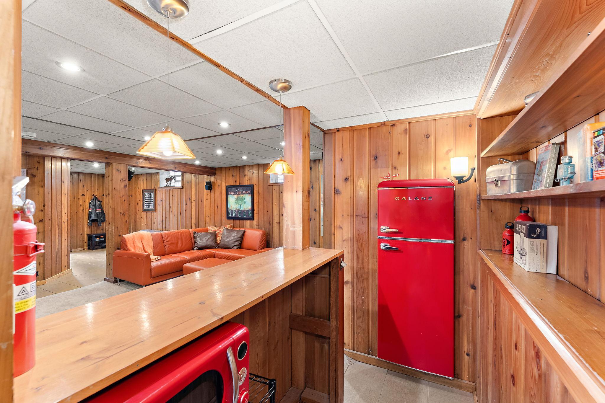 Built in vintage (looking) refrigerator in bar area