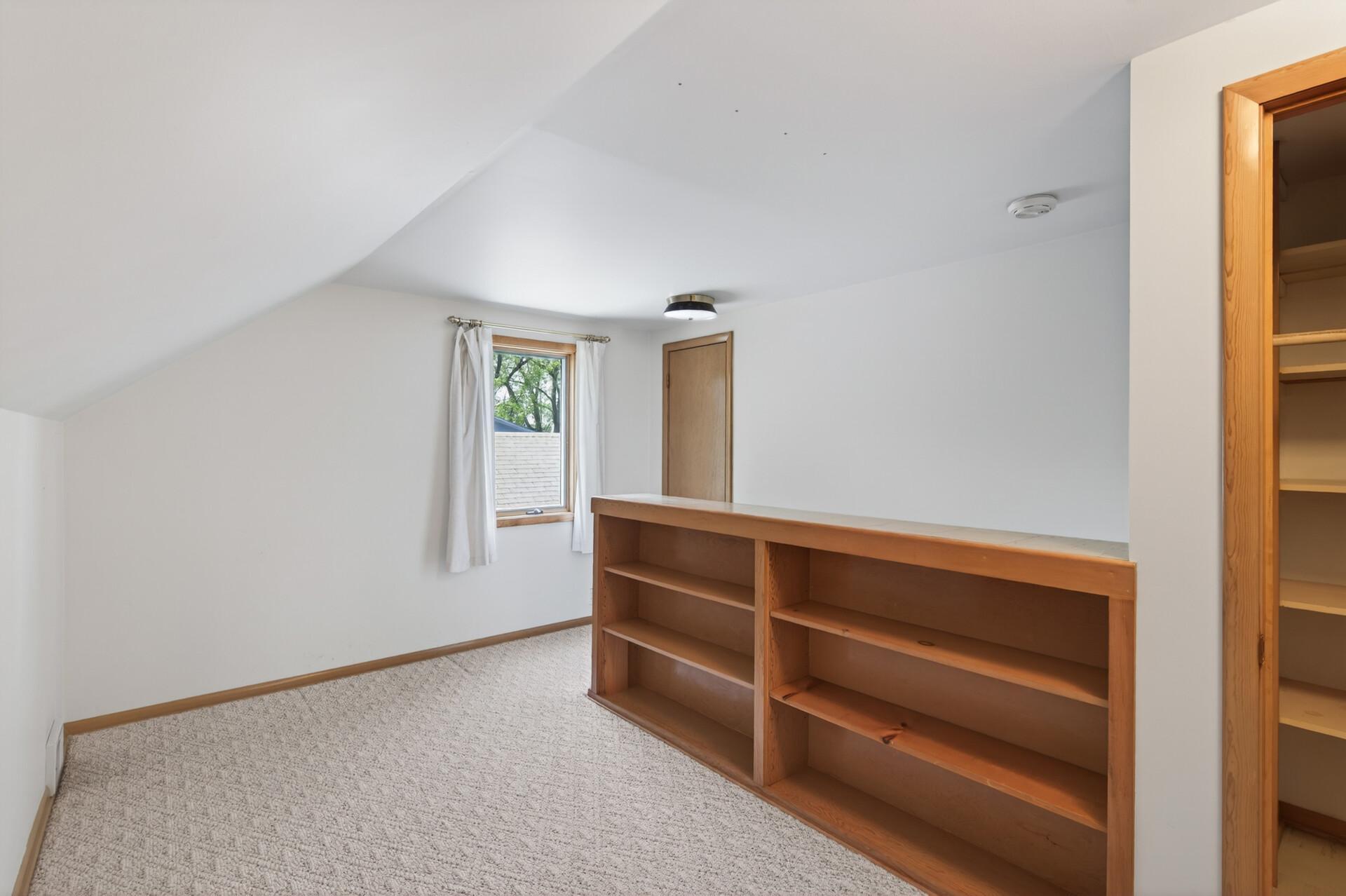 There is a single casement window at the top of the stairway for ventilation and natural light.