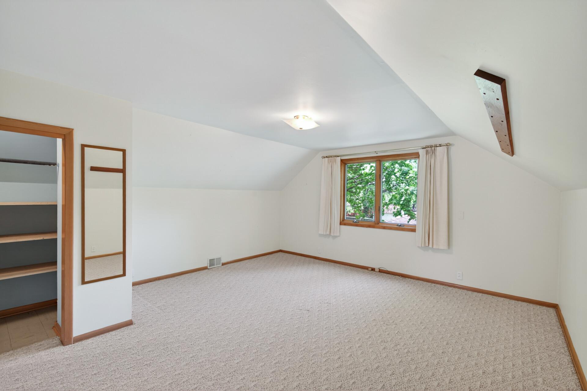 Bedroom # 3 upstairs with closet.