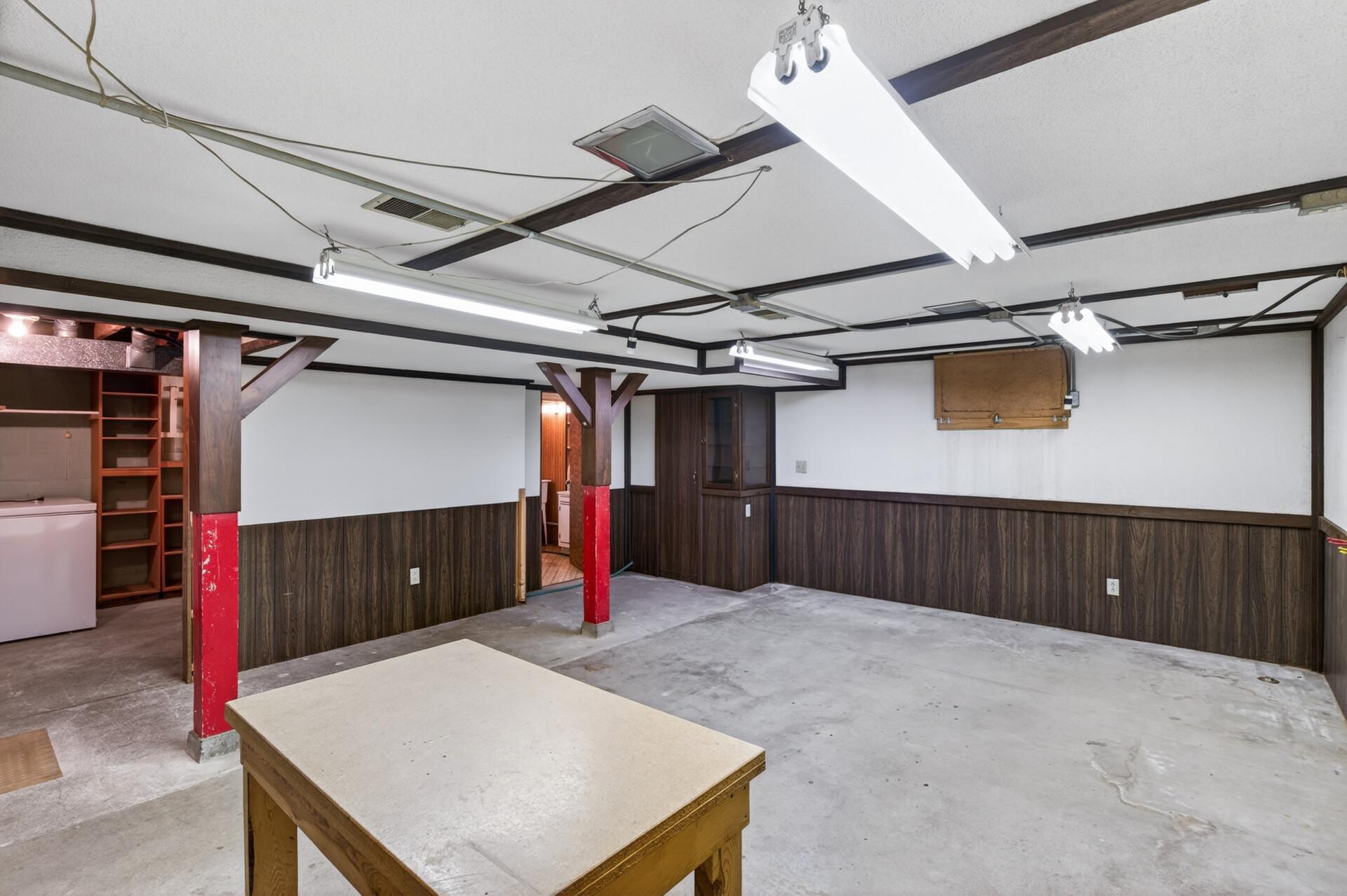 There is a unfinished area in the basement that could be turned into a family room without a lot of work. The seller used this space as a wood shop.