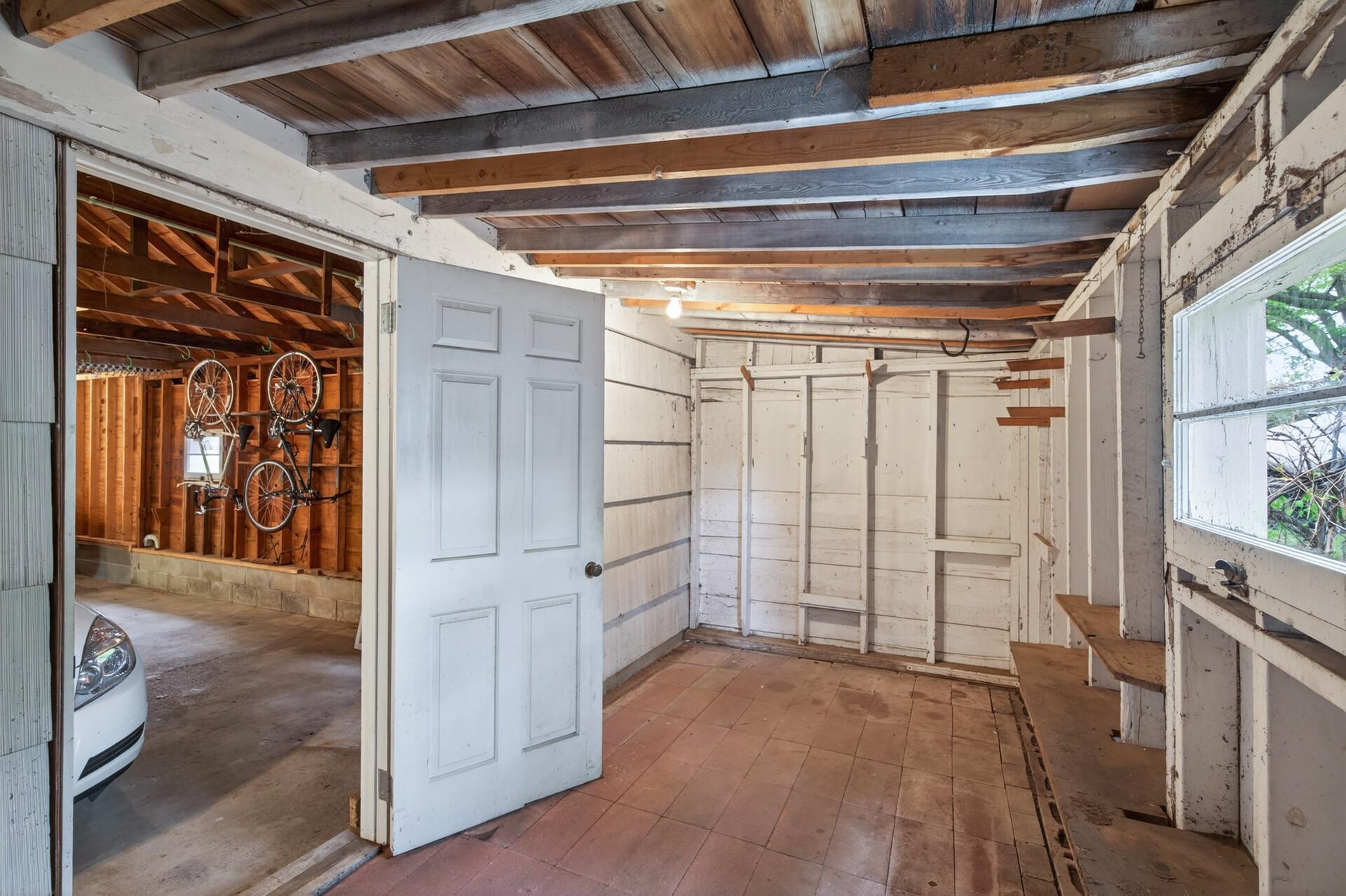 There is an 18 x 08 lean to shed at the back of the garage for more storage.