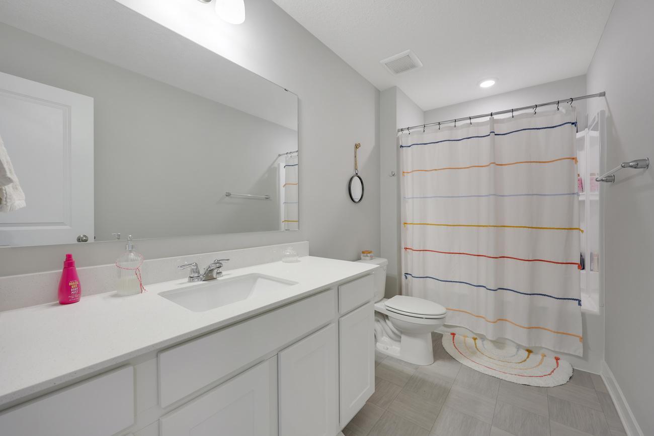 Full upstairs bath serves the other 3BRs