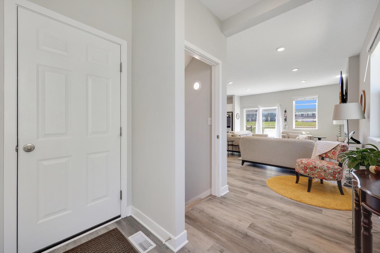 Foyer with coat closet; garage access