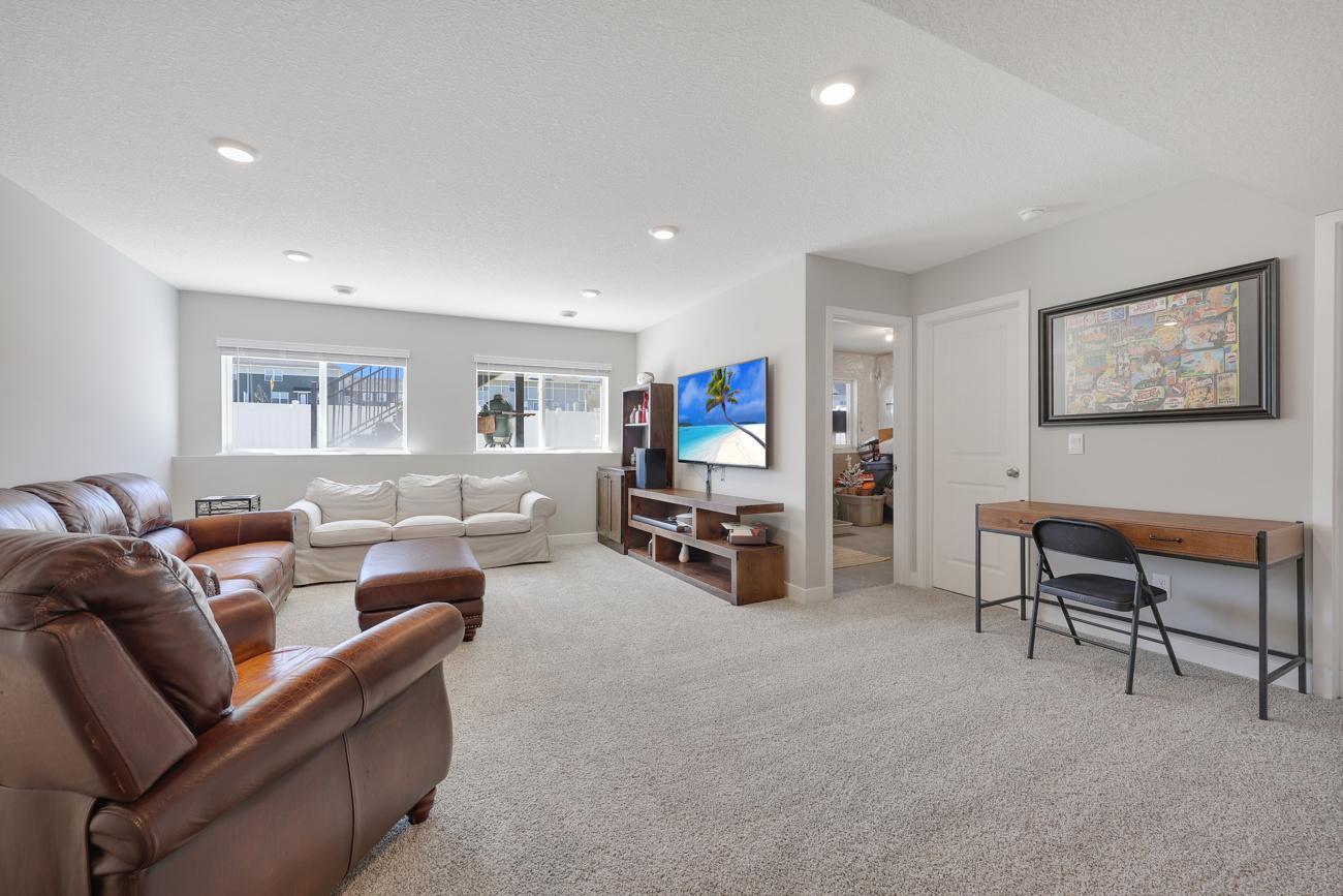 Huge family room with recessed lighting