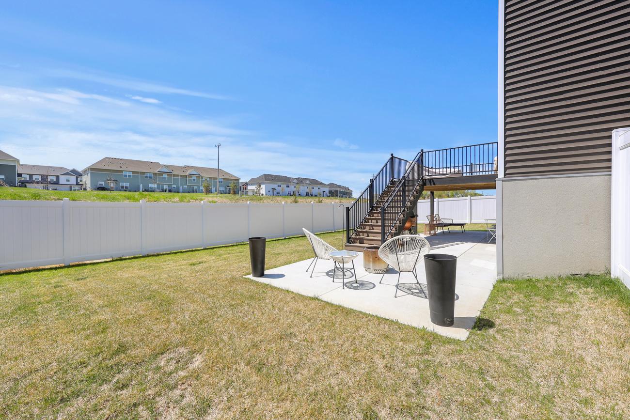 New concrete patio; privacy fence