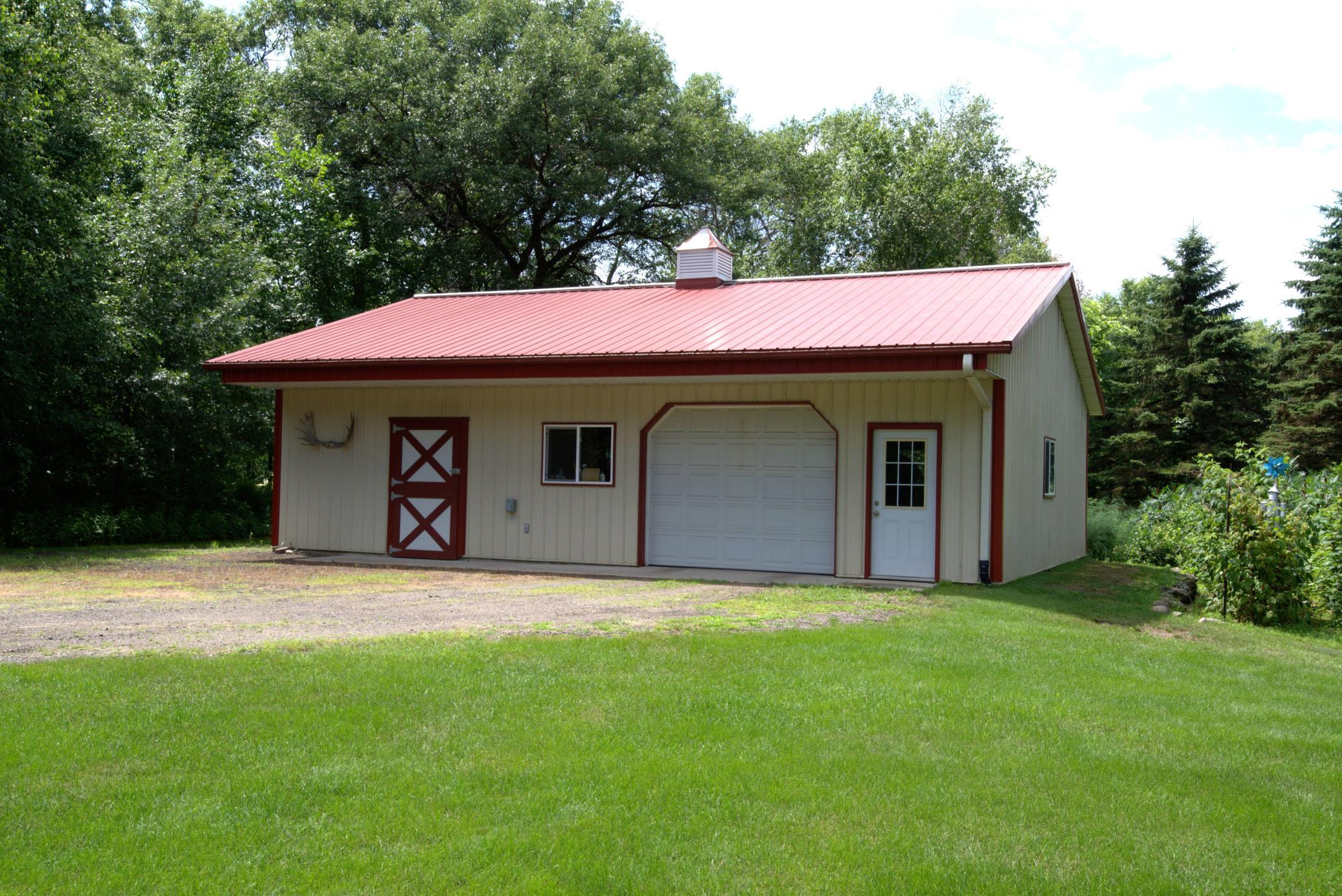 Offering many outbuildings including this 40'x32' workshop with 220 RV outlet!
