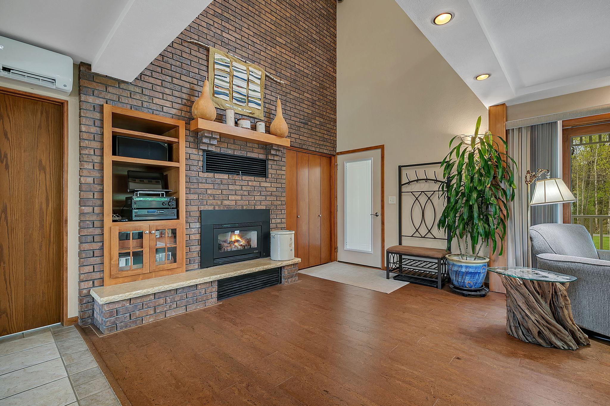 Statement brick surround fireplace feels timeless