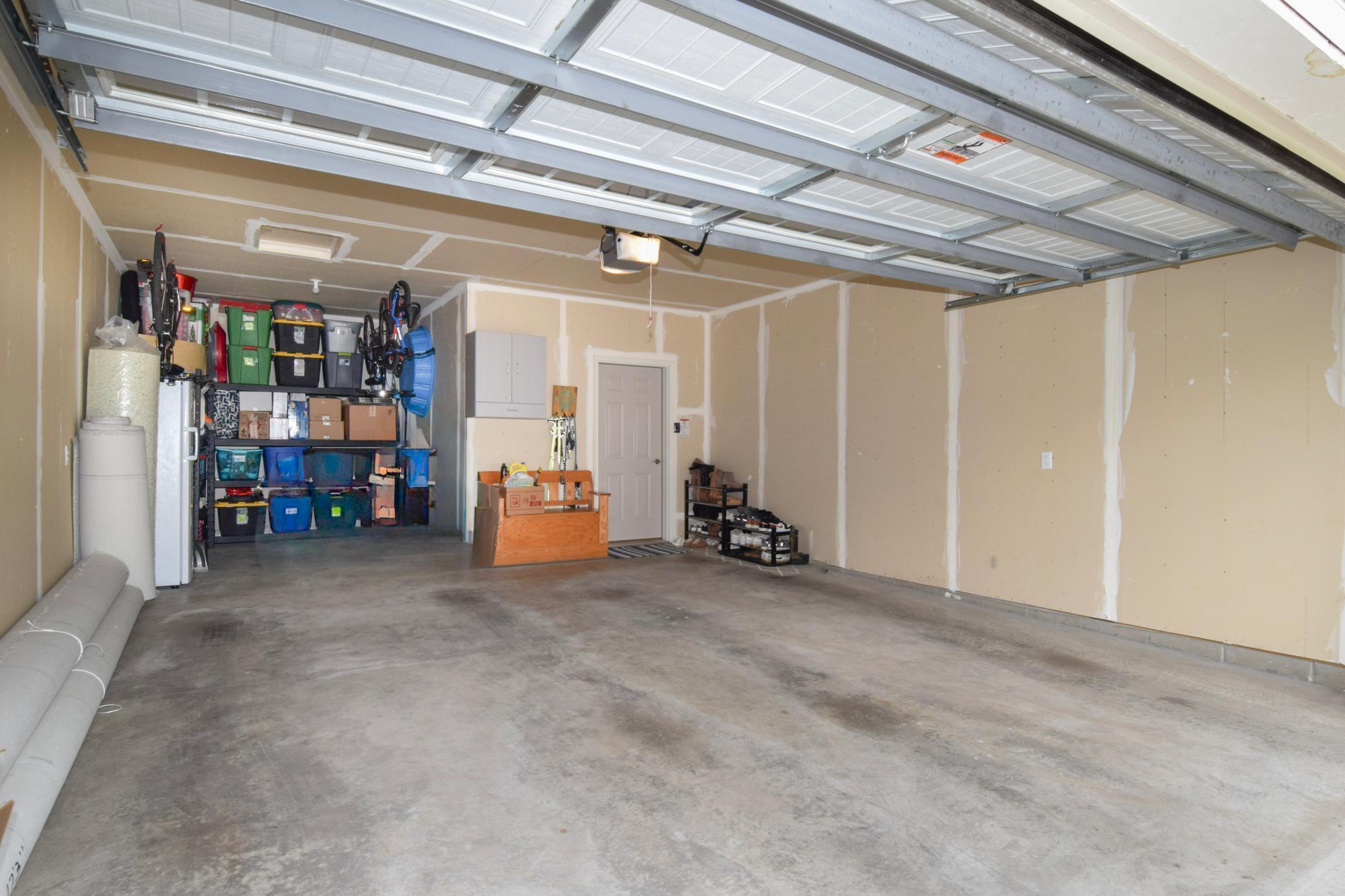 An AWESOME Garage As Well! A Great Big Two Car WITH EXTRA STORAGE!!! A Smart Garage Door Opener Completes the Package!