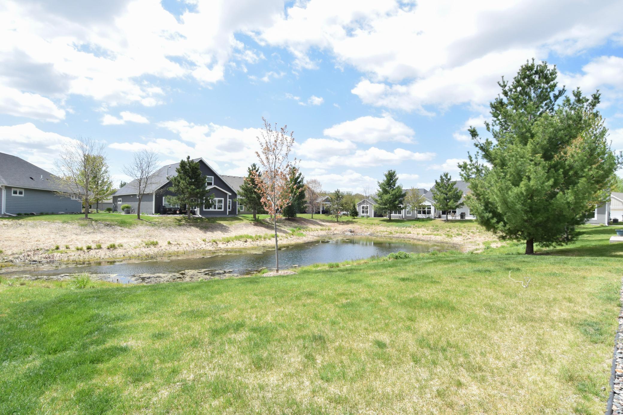 Incredibly Special & Tranquil Setting on a Pond! The Grass Will Only Get MORE Green!