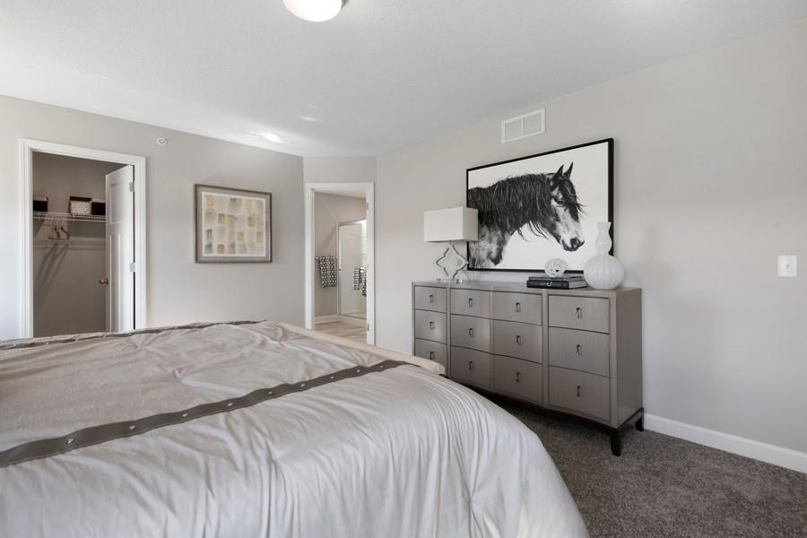 (Photo of a decorated model, actual features will vary) Another view of the spacious owner's suite.