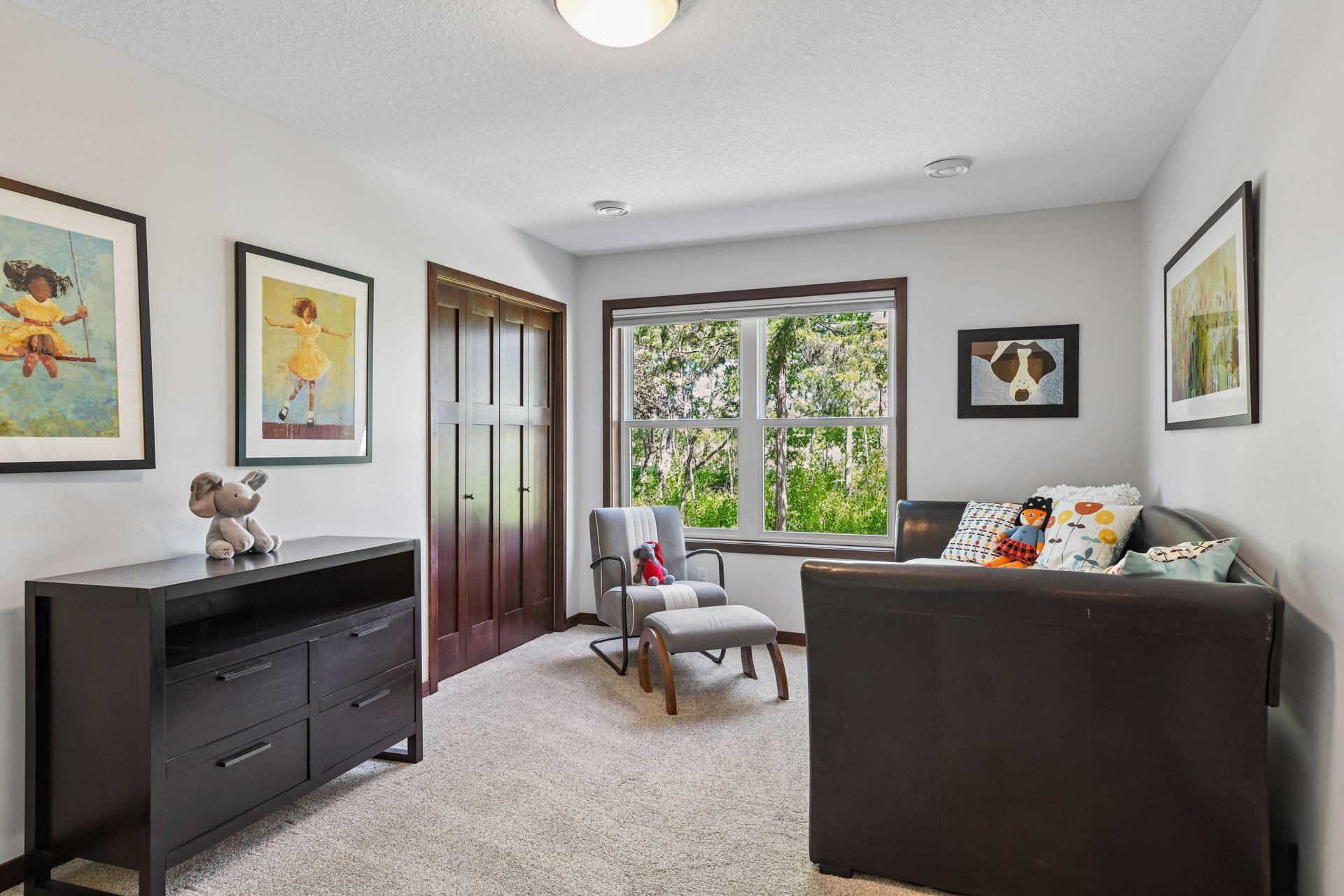 The third bedroom is larger than it appears. Once the deep daybed is gone, the room could accommodate up to a king-size bed.
