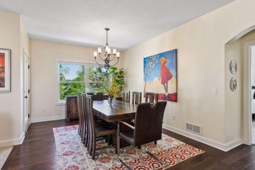 The primary dining area can accommodate a large table that can be expanded for entertaining.