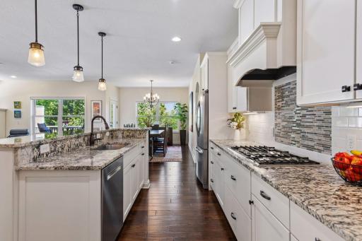The dining area is conveniently located just steps from the kitchen.