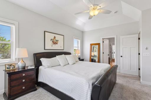 The primary bedroom suite connects to its own private, full-size, en suite bathroom.