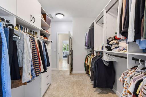 From the primary bathroom en suite you can walk straight into the homeowner's closet, which is larger than pictured, and features many built-in's for shoes and jewelry (not shown), and storage.