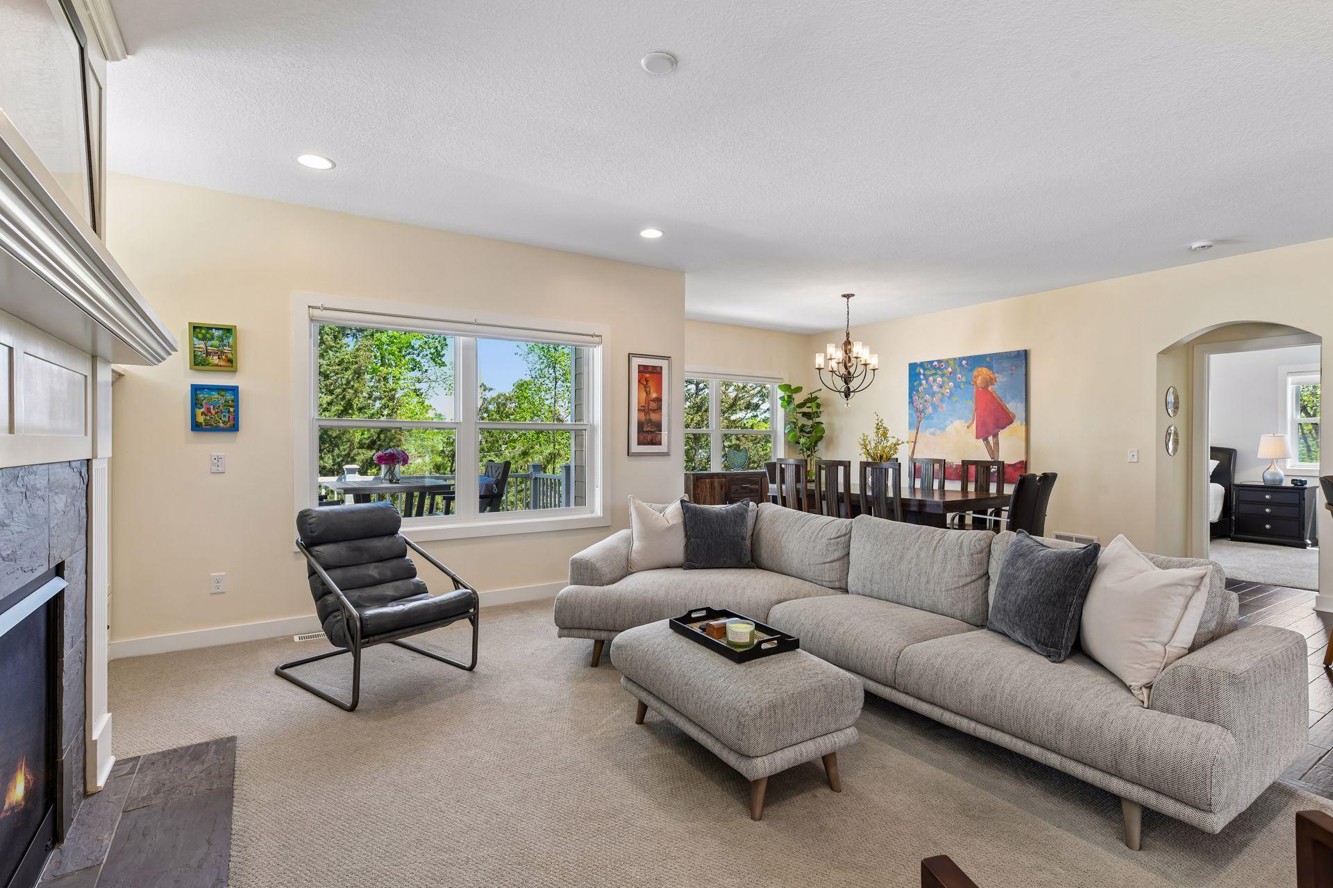 From this view, note the elevated deck through the windows (accessible from the dining room), and the entrance to the primary bedroom suite.