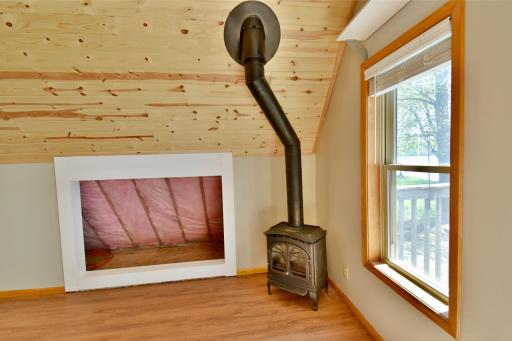 Propane stove. The crawl space can be used for storage. A TV was previously placed across the front of the opening.