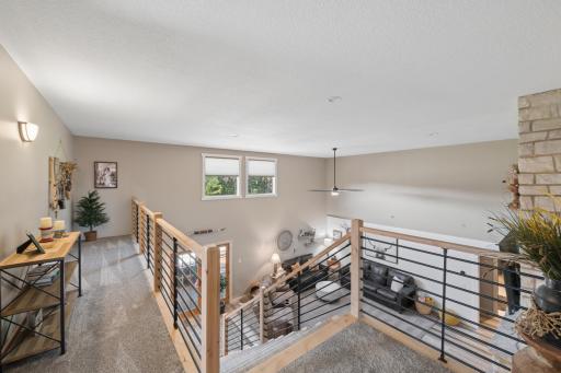 Open rail stairway with catwalk overlooking the Great room below