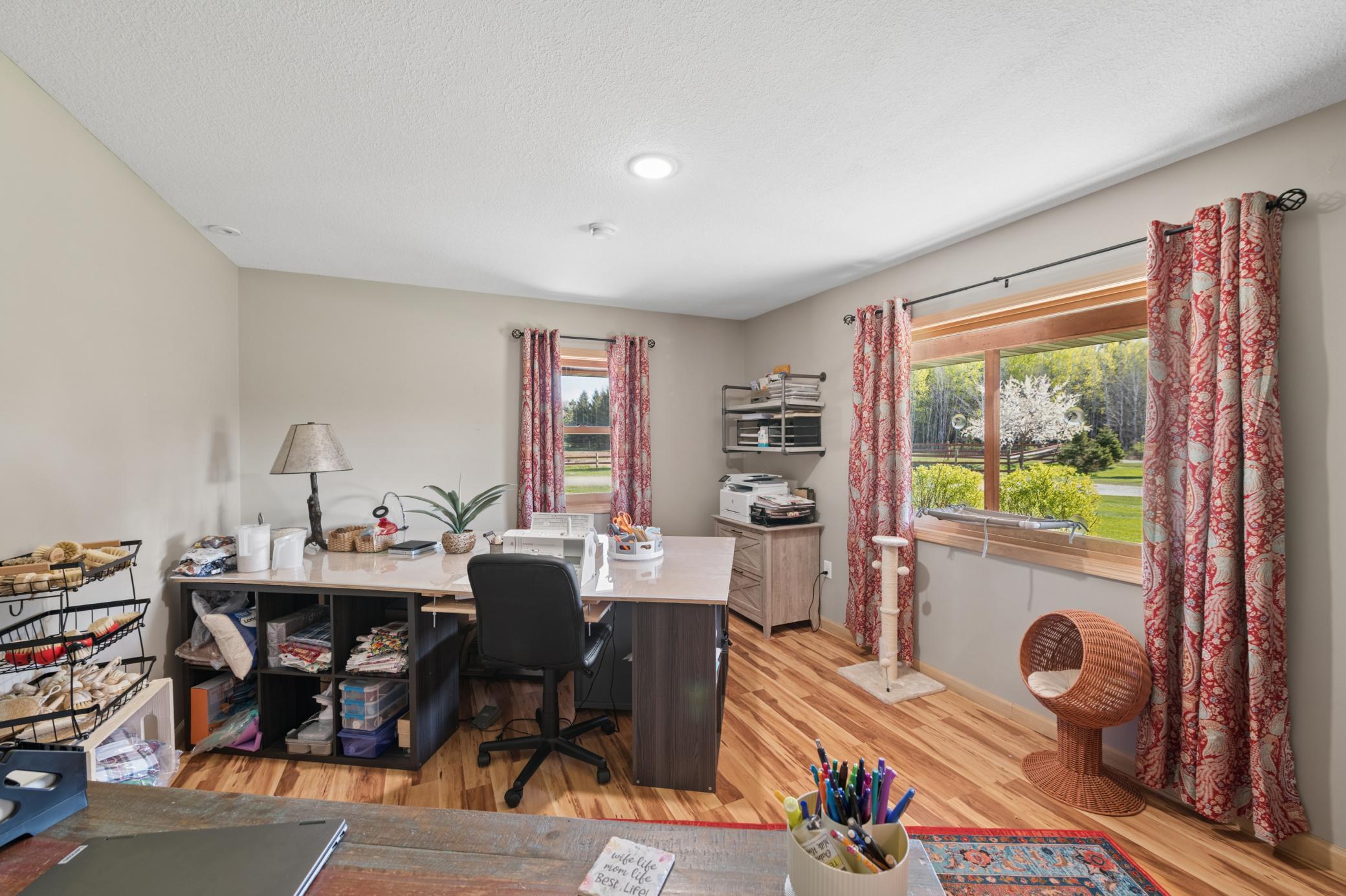 Office with French doors just off the entryway for meeting clients!