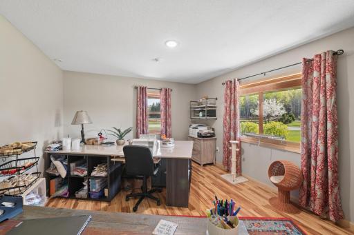 Office with French doors just off the entryway for meeting clients!