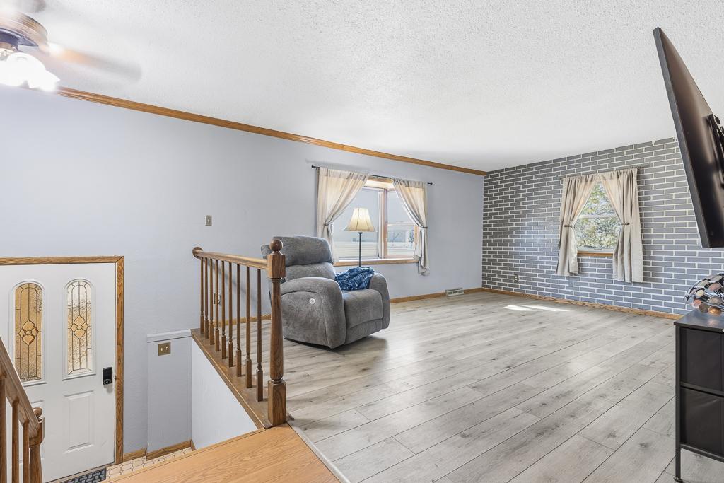 The upper level living space is a great size for any furniture arrangement!